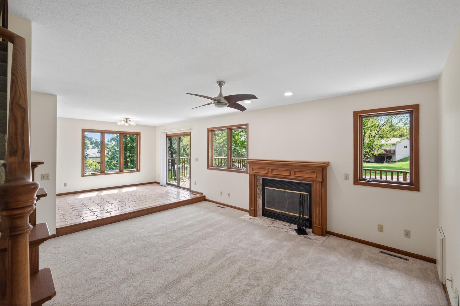 Wood burning fireplace, oversized windows and views of water from every angle.