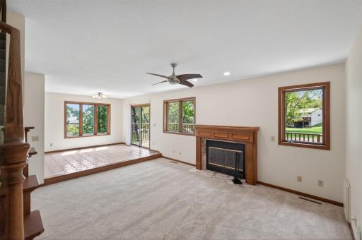 Wood burning fireplace, oversized windows and views of water from every angle.
