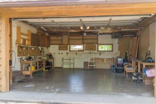 The oversized, heated garage has work benches for any size project.