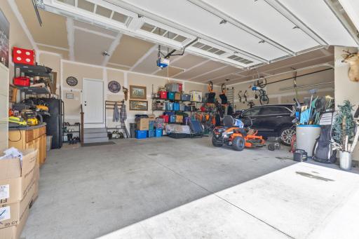 Oversized 3 car garage sheetrocked with insulated walls