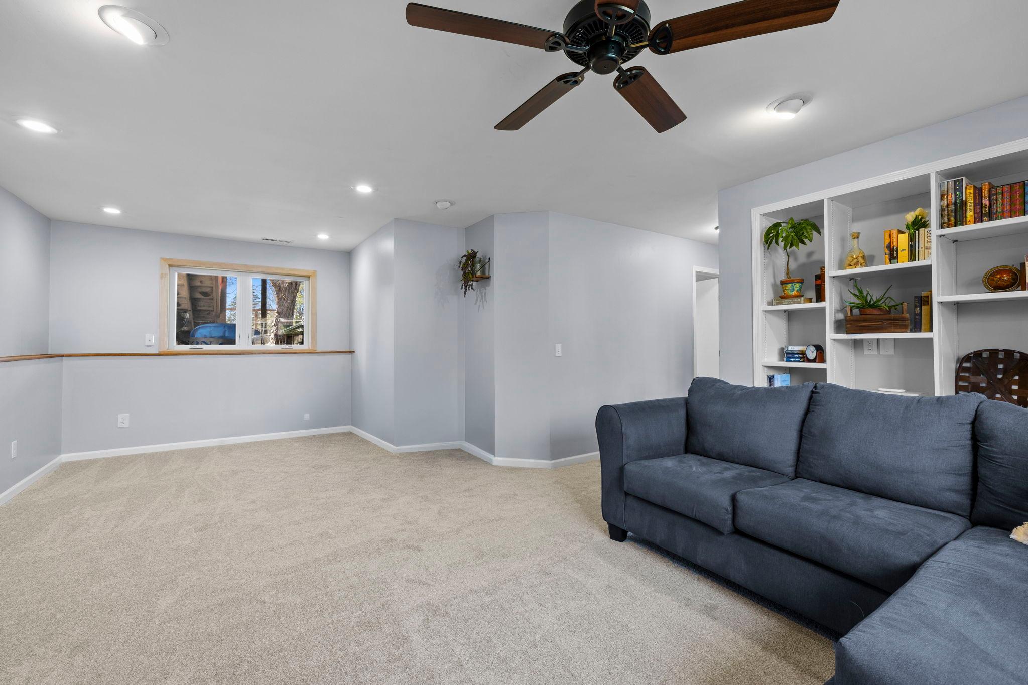 An adjacent flex area easily adapts to your needs, whether it’s a second sitting area, office, or hobby space.