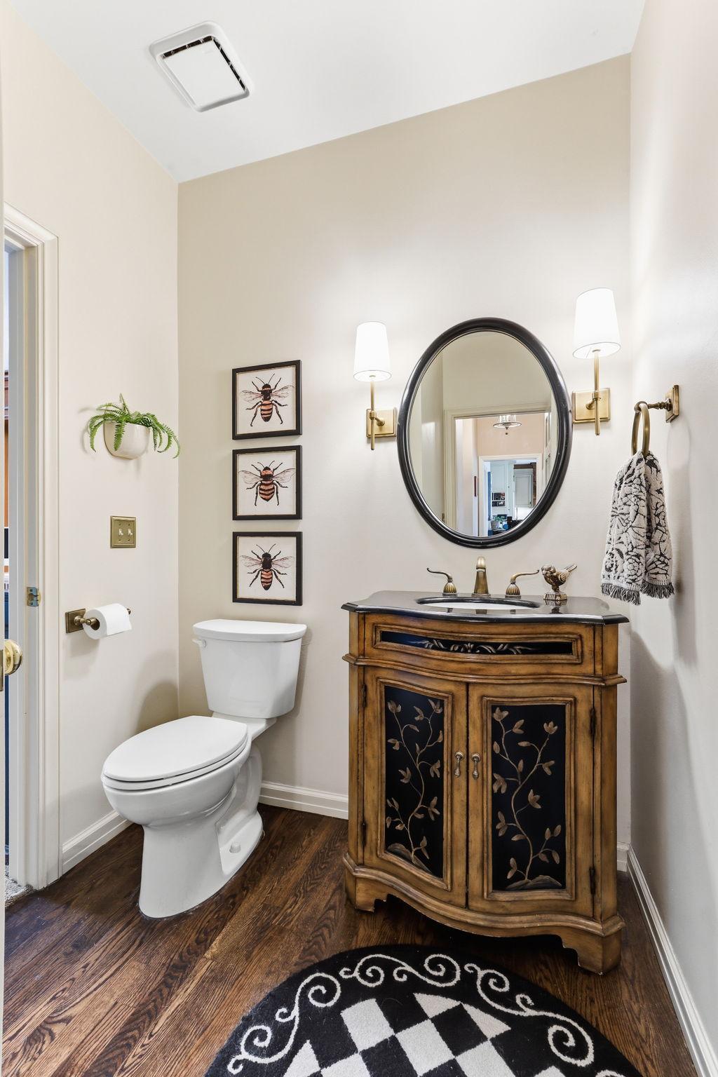 Polished fixtures and subtle décor complete the space, creating a refined, upscale impression for guests.
