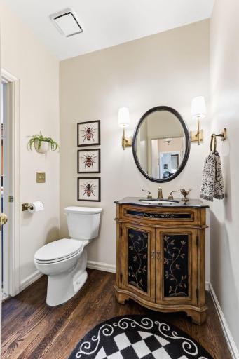 Polished fixtures and subtle dÃ©cor complete the space, creating a refined, upscale impression for guests.