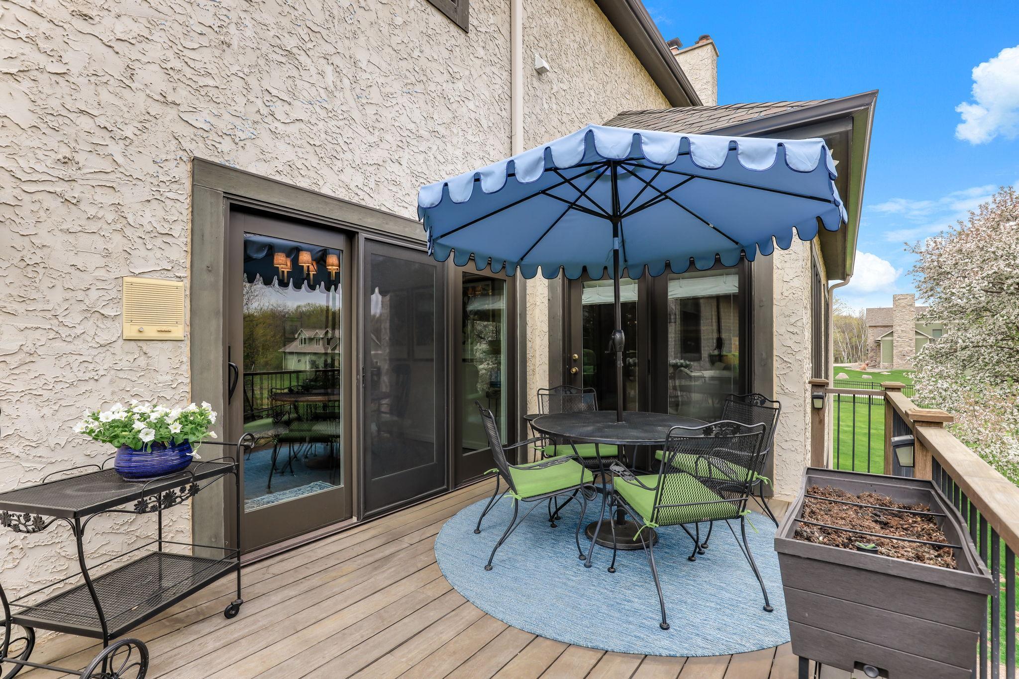 Step outside to an exceptional outdoor living space centered around a stunning Cumaru hardwood deck, prized for its rich color, exceptional durability, and natural resistance to the elements.