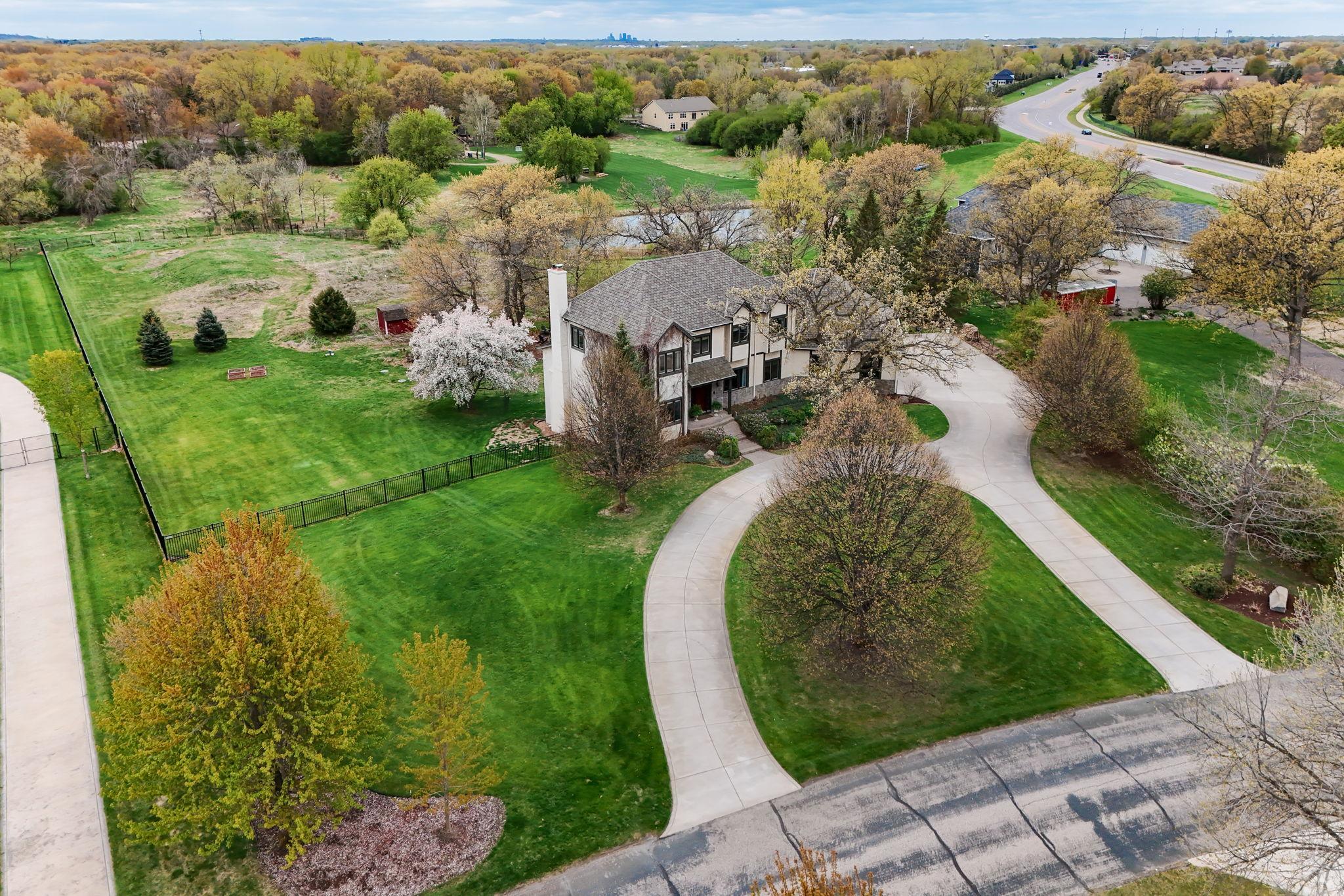 The acreage feels both luxurious and practical, offering a stunning backdrop for outdoor enjoyment.