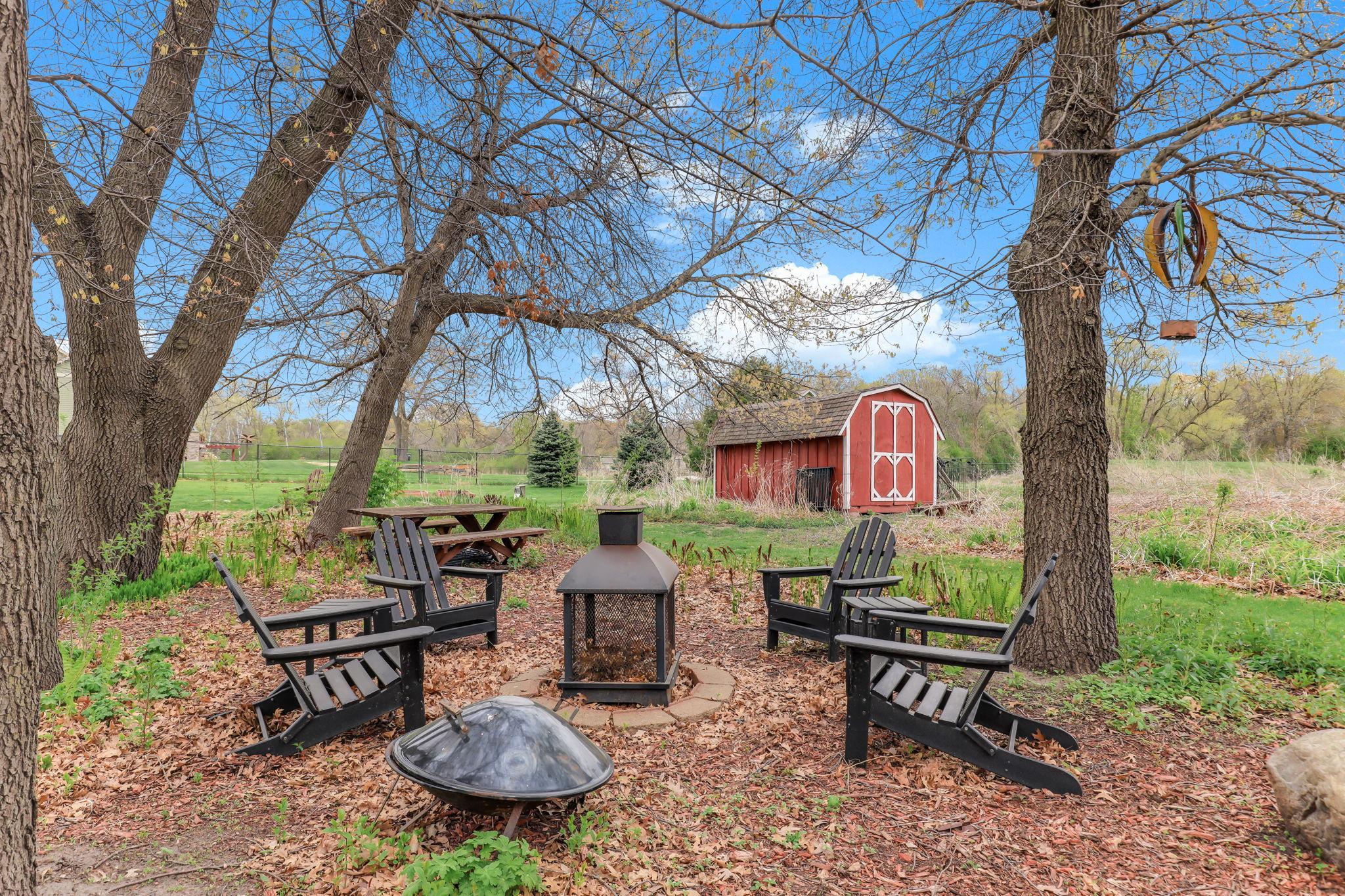 Expansive and thoughtfully curated, creating a picturesque outdoor setting perfect for recreation, pets, and enjoying the natural surroundings.