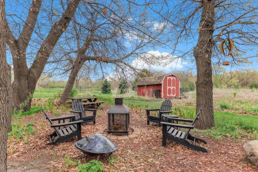 Expansive and thoughtfully curated, creating a picturesque outdoor setting perfect for recreation, pets, and enjoying the natural surroundings.