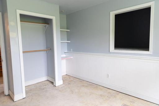 Bedroom 3 on lower level has unique space in the wall