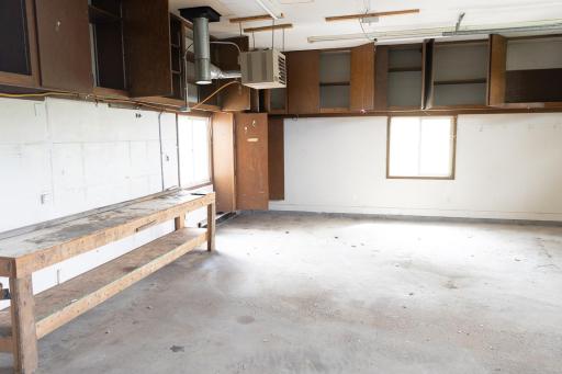 Insulated and heated garage with 10' doors
