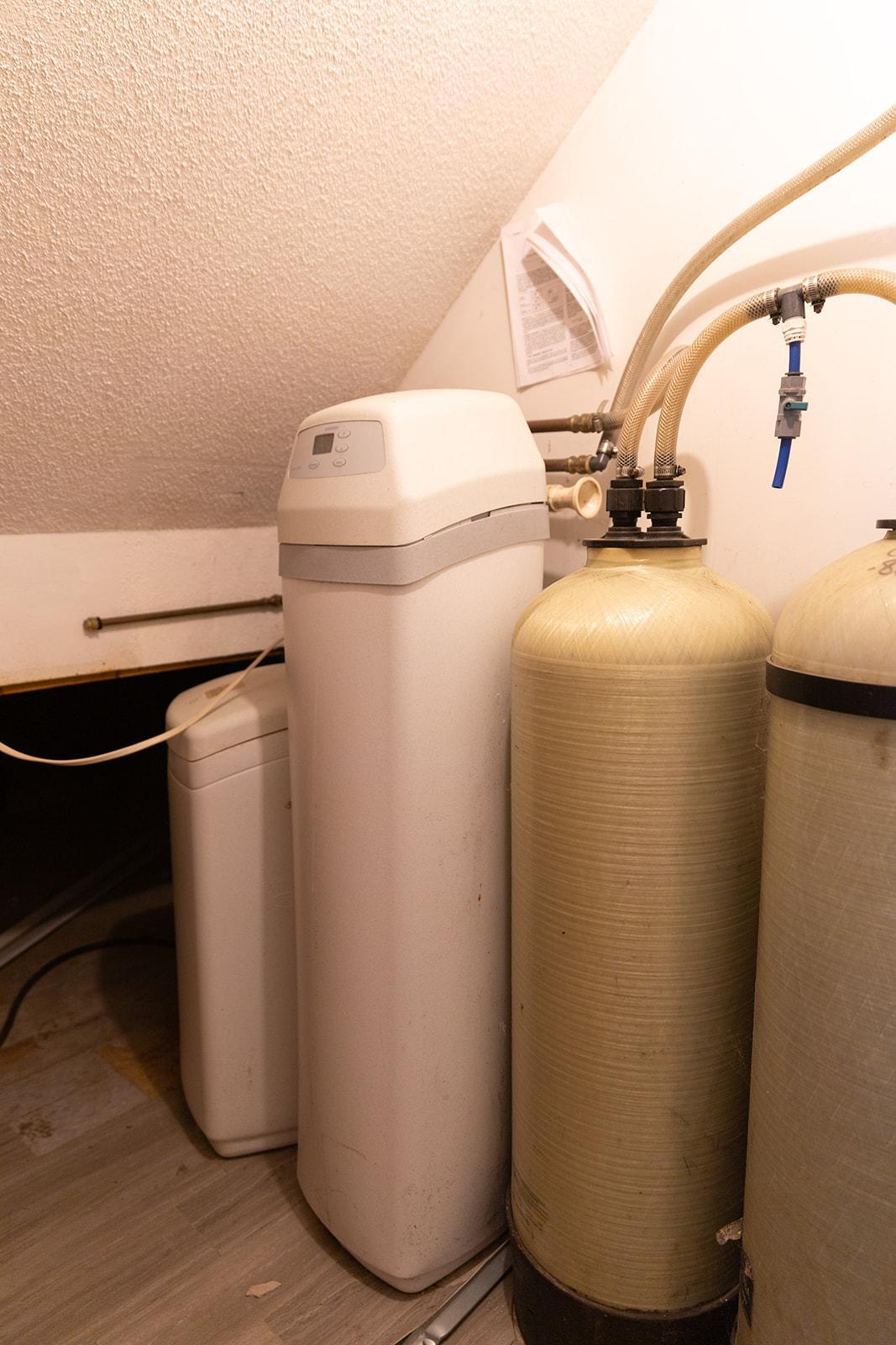 Water purification system and softeners