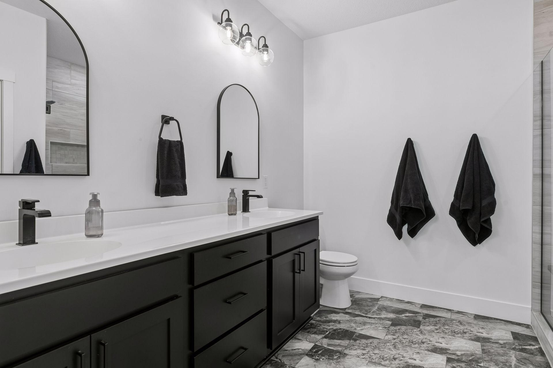 This master bath is a '10' with double sinks and walk in tile shower