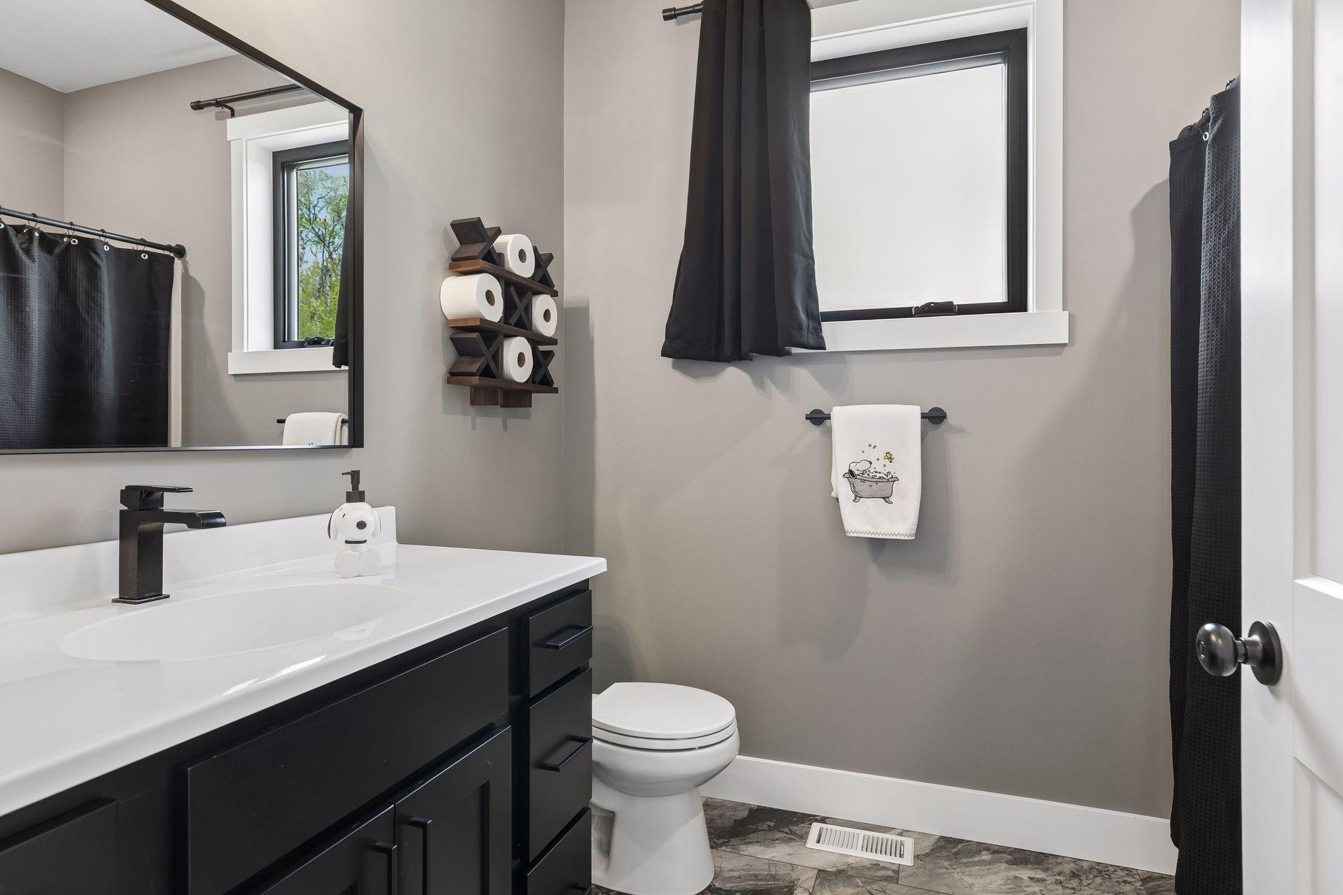 Additional full bath on the main level as well
