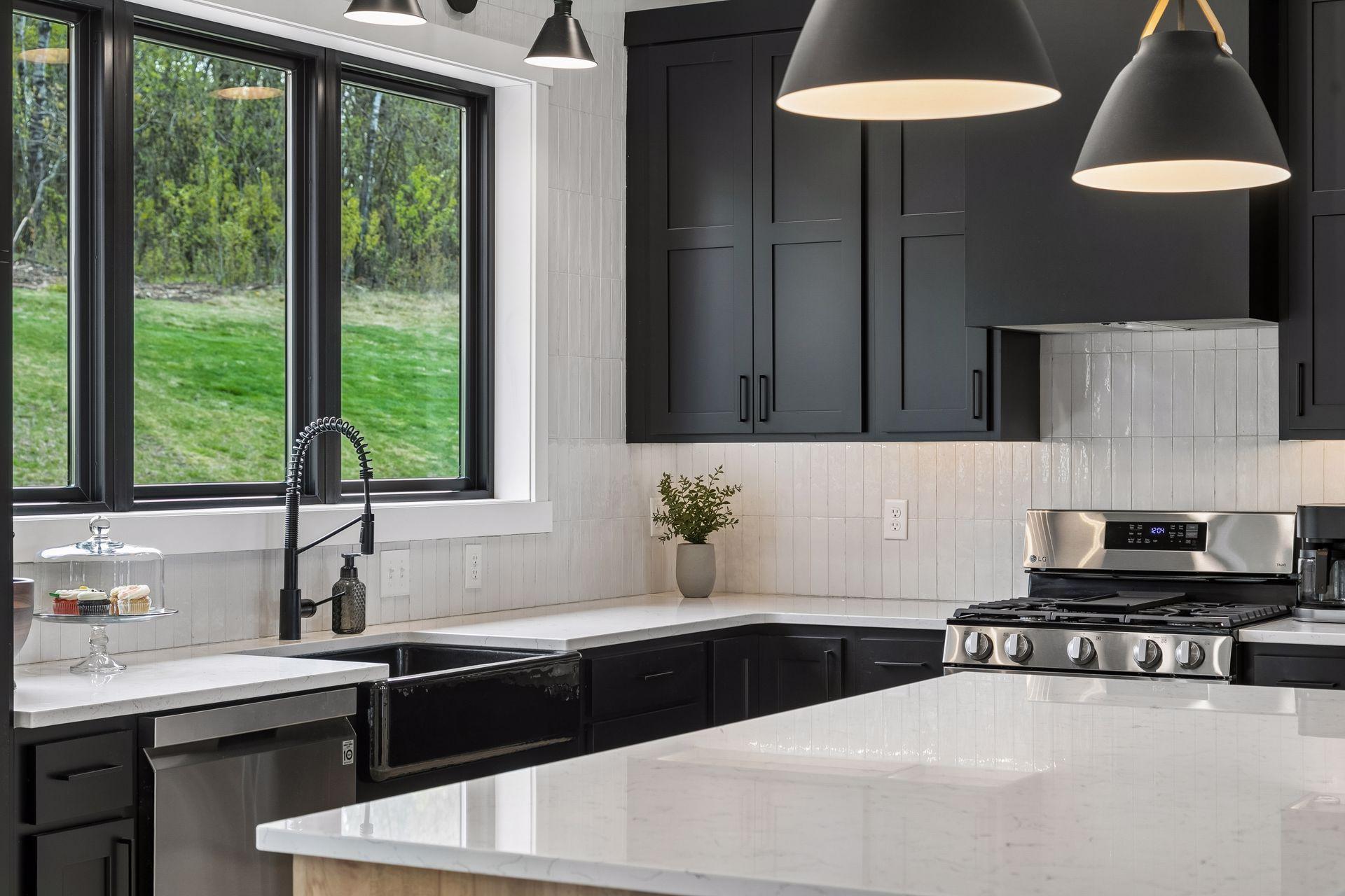 Expansive kitchen island with gorgeous quartz countertop