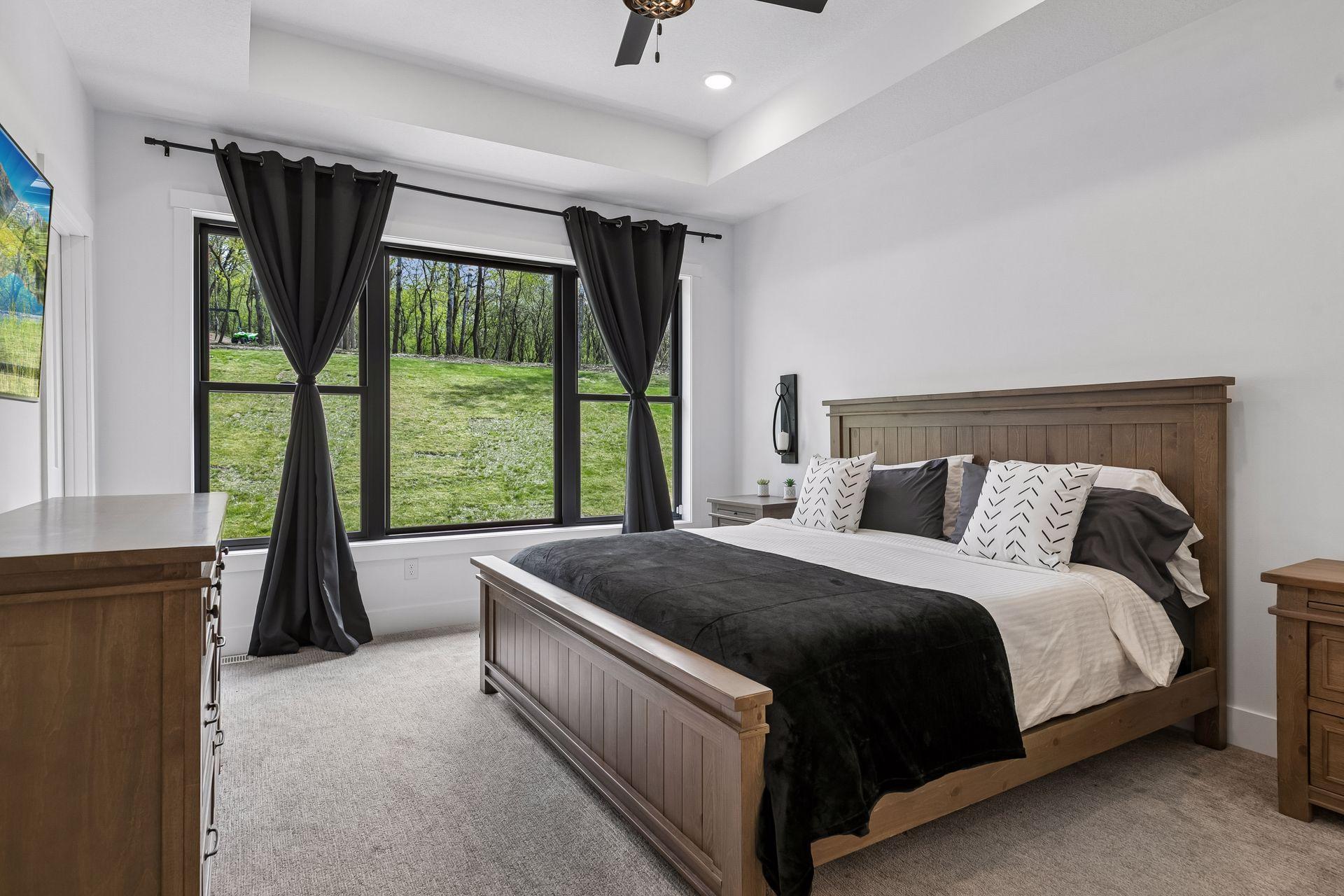 Roomy master suite with beautiful view of private back yard