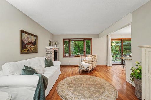 Bay window in living room offers views of deck and backyard.