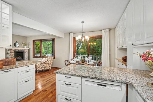 View from the kitchen of dining area and living room.