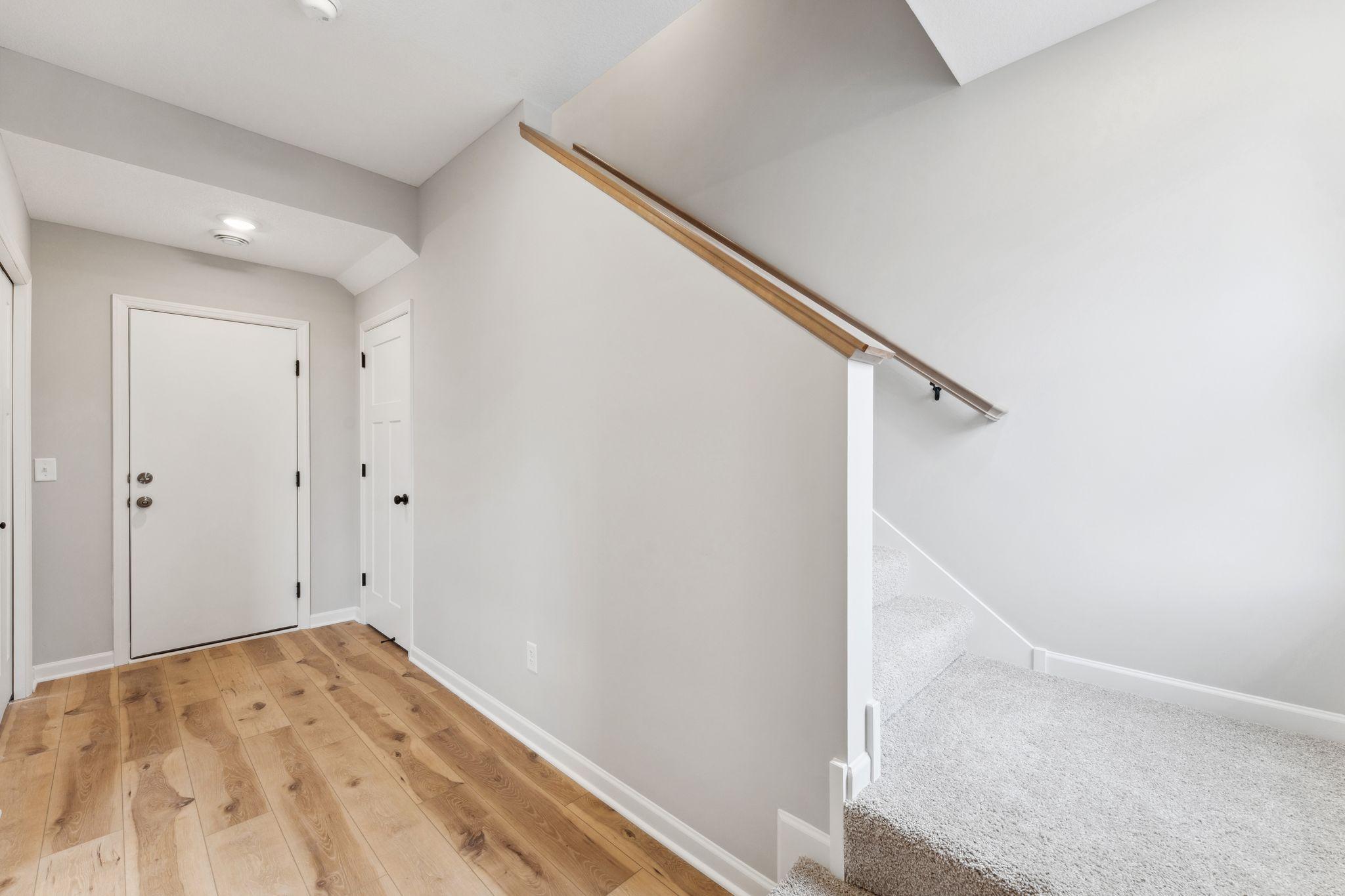 Entry from the garage. Similar home shown, color and options can vary.