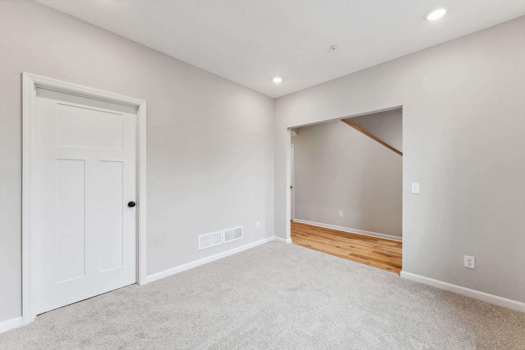 From the garage entry is the multi purpose rec room perfect for a home office, gym, lounge or play area. Similar home shown, color and options can vary.