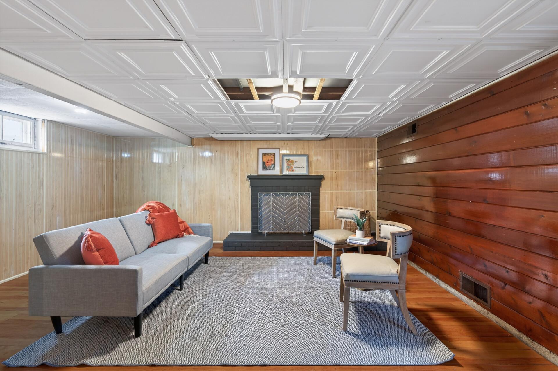 The finished basement is ready for your personalization. Note that the basement level fireplace is currently inoperable.