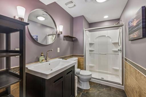 Lower level bathroom has been updated. One of three bathrooms in the home.