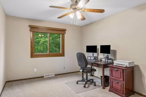 This freshly painted room can be used as an office or plenty of room for a bedroom.