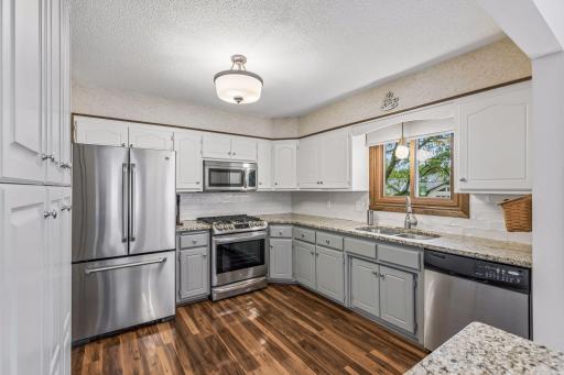 Tile backsplash and granite countertops are one of the stellar features of this kitchen.