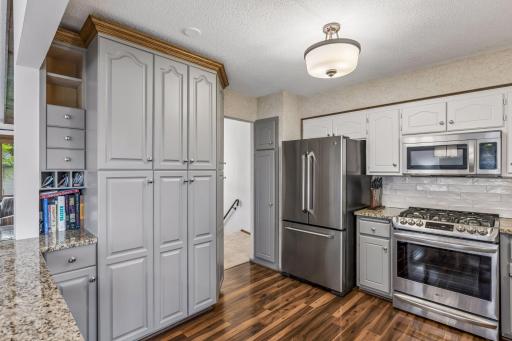 Plenty of storage space and abundant countertops make preparing a meal an easy task.