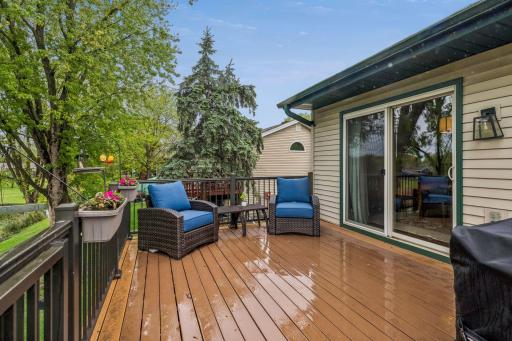 Low maintenance deck overlooks the well-maintained backyard.