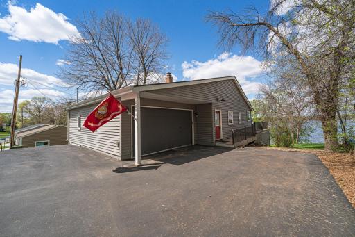 From the moment you pull in the driveway, you'll see the lake beyond the home.