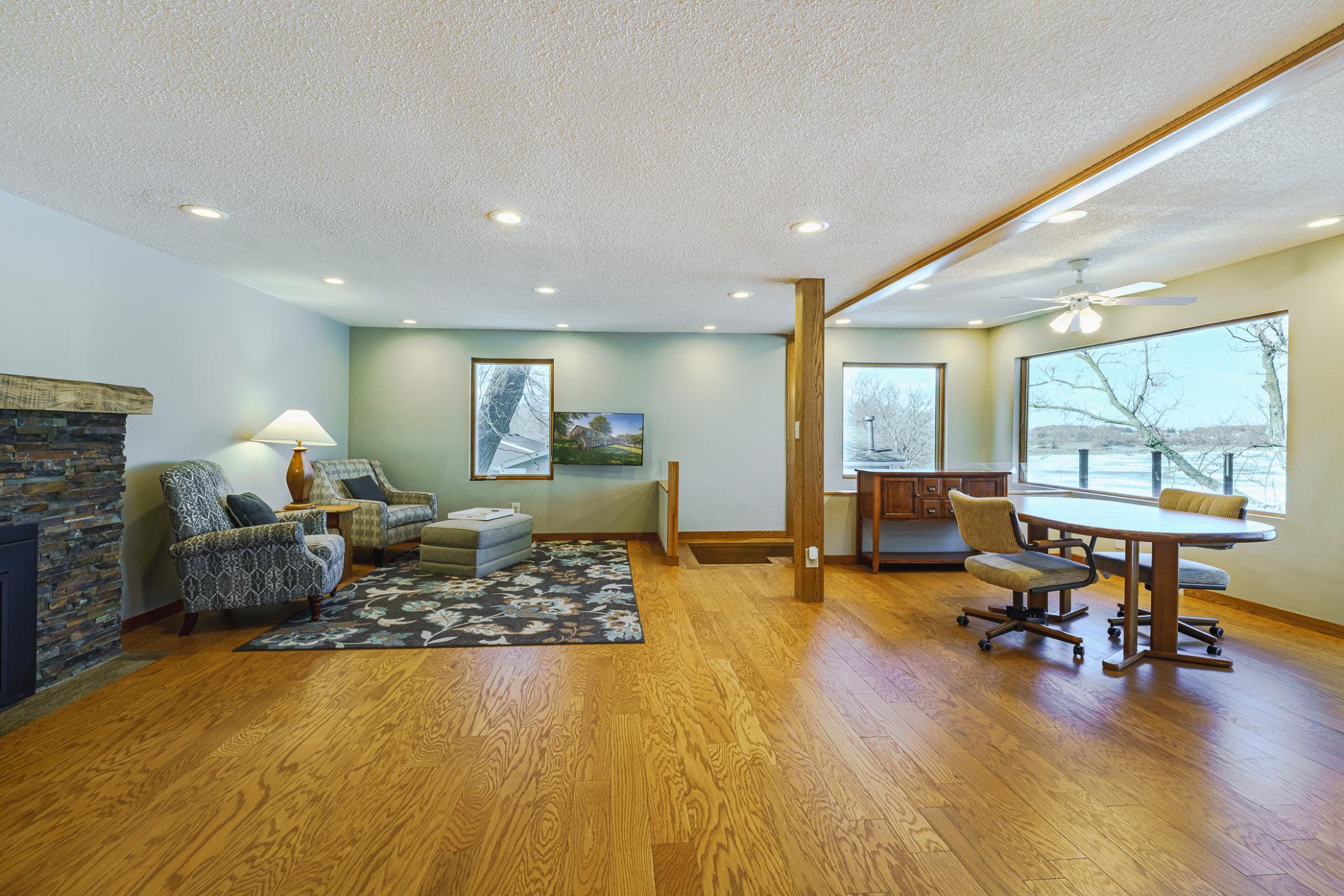 Oversized NEW Andersen windows were added that offer wide open views of the lake. The NEW WINDOWS with window film to cut cooling costs and improve enjoyment of the lake views.