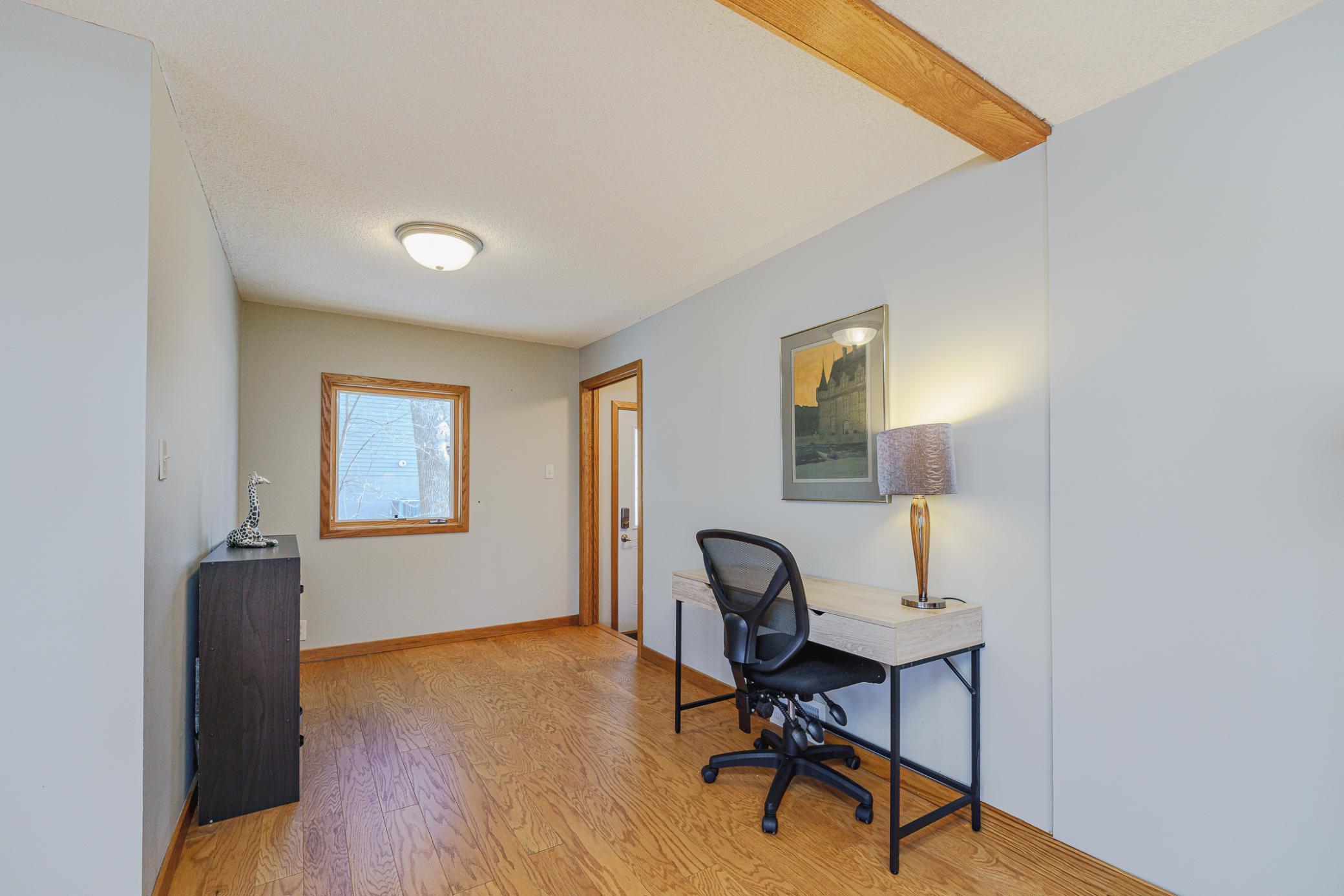 This entry space off the foyer makes a nice home office or additional seating area.