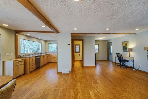 A main floor bathroom is conveniently near, and discretely separated from, the kitchen.