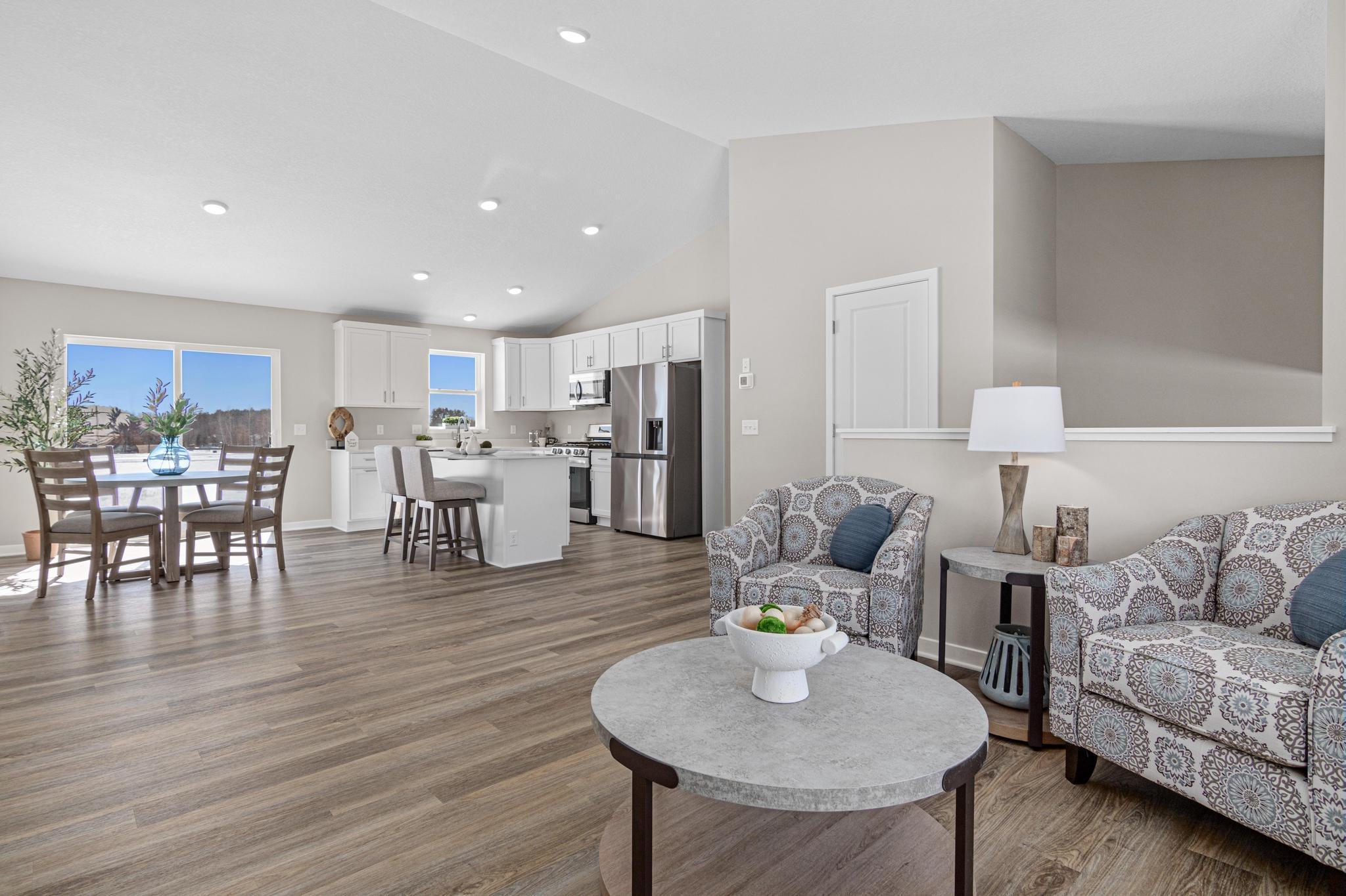 Photo taken of another home with similar plan and finishes. Photos and renderings may not depict actual plan, materials, & finishes may vary. All measurements are approximate.