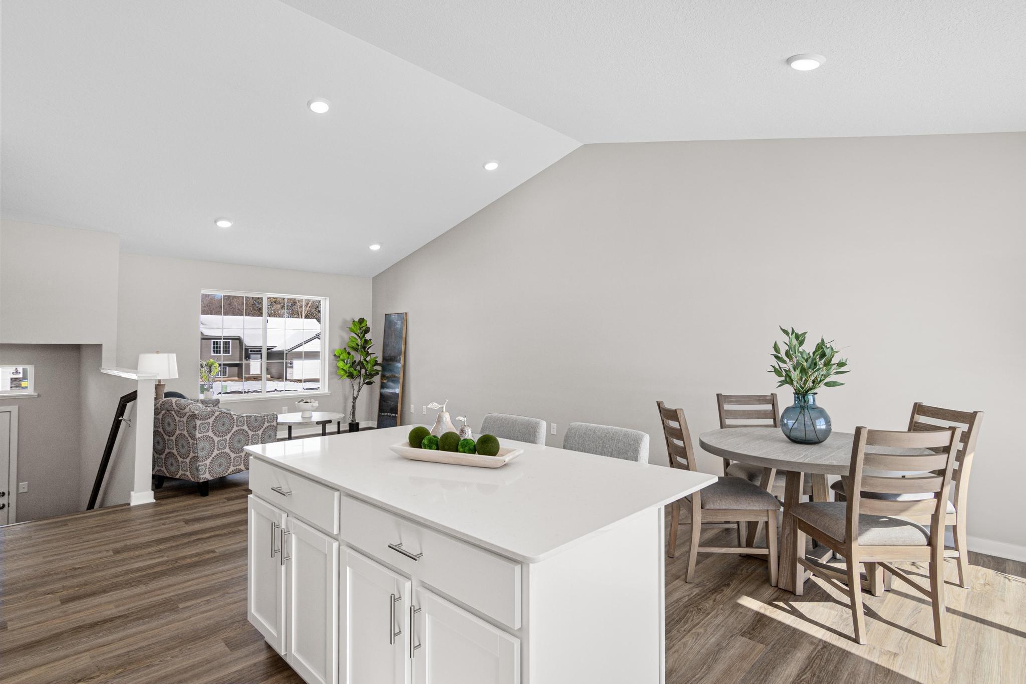 Photo taken of another home with similar plan and finishes. Photos and renderings may not depict actual plan, materials, & finishes may vary. All measurements are approximate.