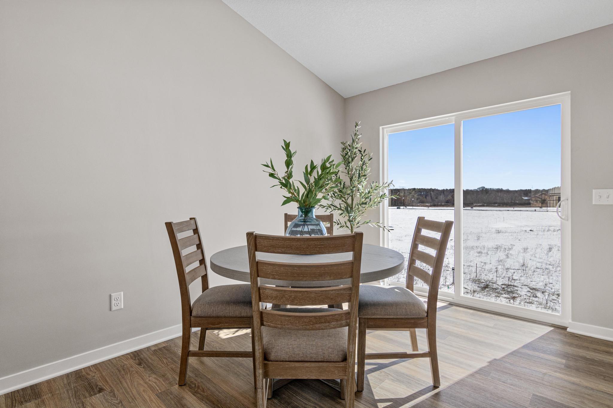 Photo taken of another home with similar plan and finishes. Photos and renderings may not depict actual plan, materials, & finishes may vary. All measurements are approximate.