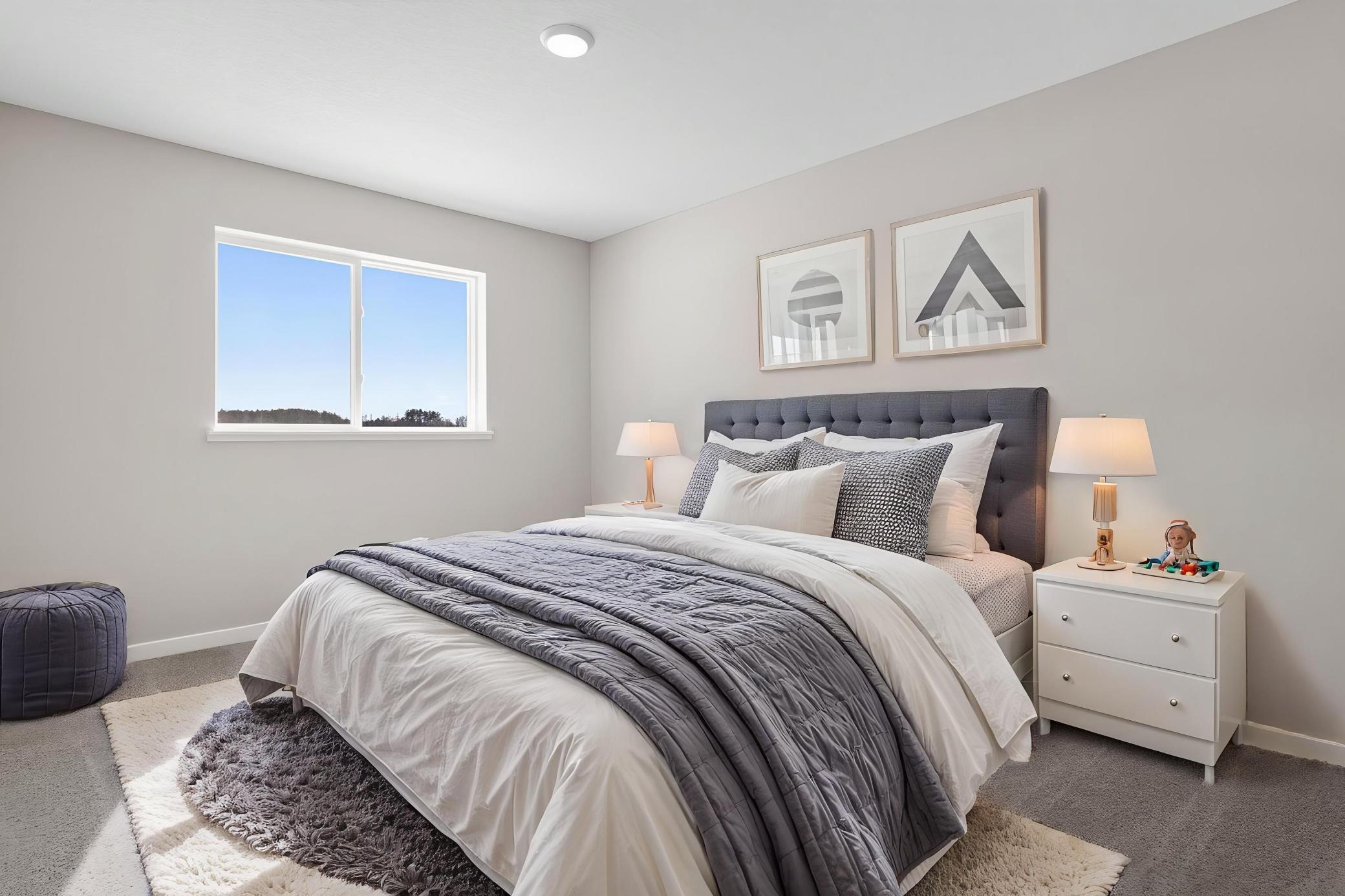 Bedroom 2, Virtually Staged. Photo taken of another home with similar plan and finishes. Photos and renderings may not depict actual plan, materials, & finishes may vary. All measurements are approximate.