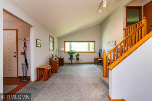 The vaulted ceiling above the living and dining rooms creates a touch of drama!