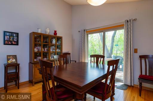 Formal dining room walks out to the large backyard deck.