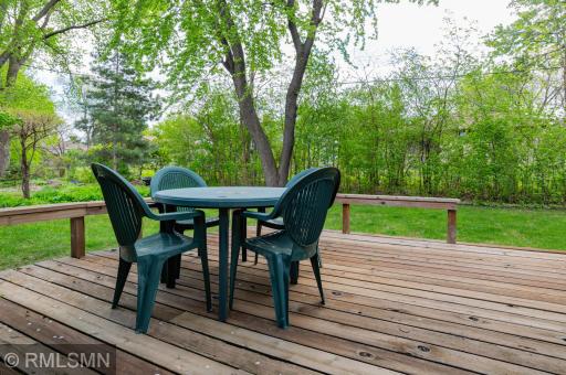 Enjoy the backyard deck surrounded by picturesque privacy!