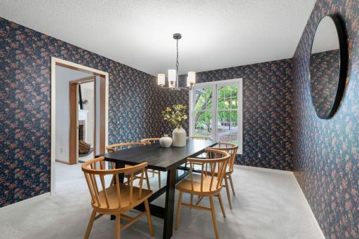 Formal dining room with view to the backyard