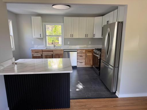 Kitchen opens beautifully into the main level living space