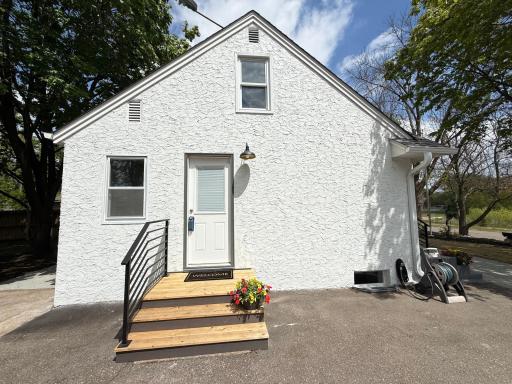Updated rear/side entry with clean modern curb appeal