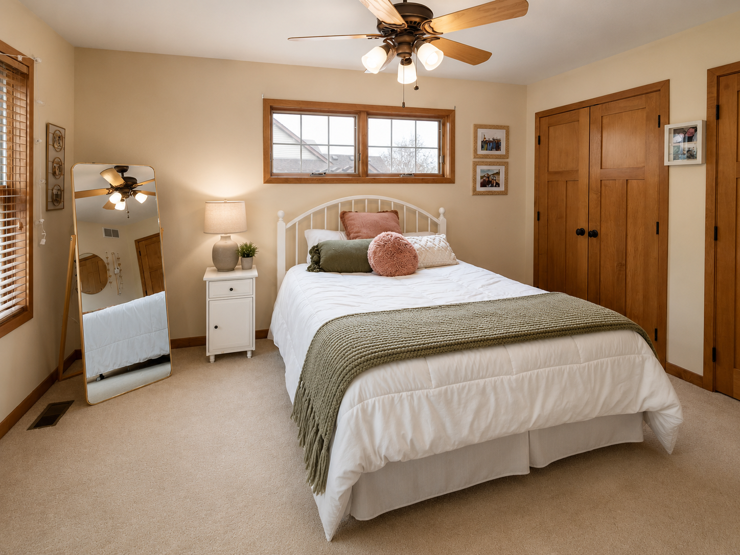 Luxury details throughout like transom windows, solid 3-panel doors, and ceiling fans.