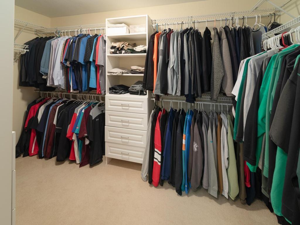 Large walk-in closet with organizers