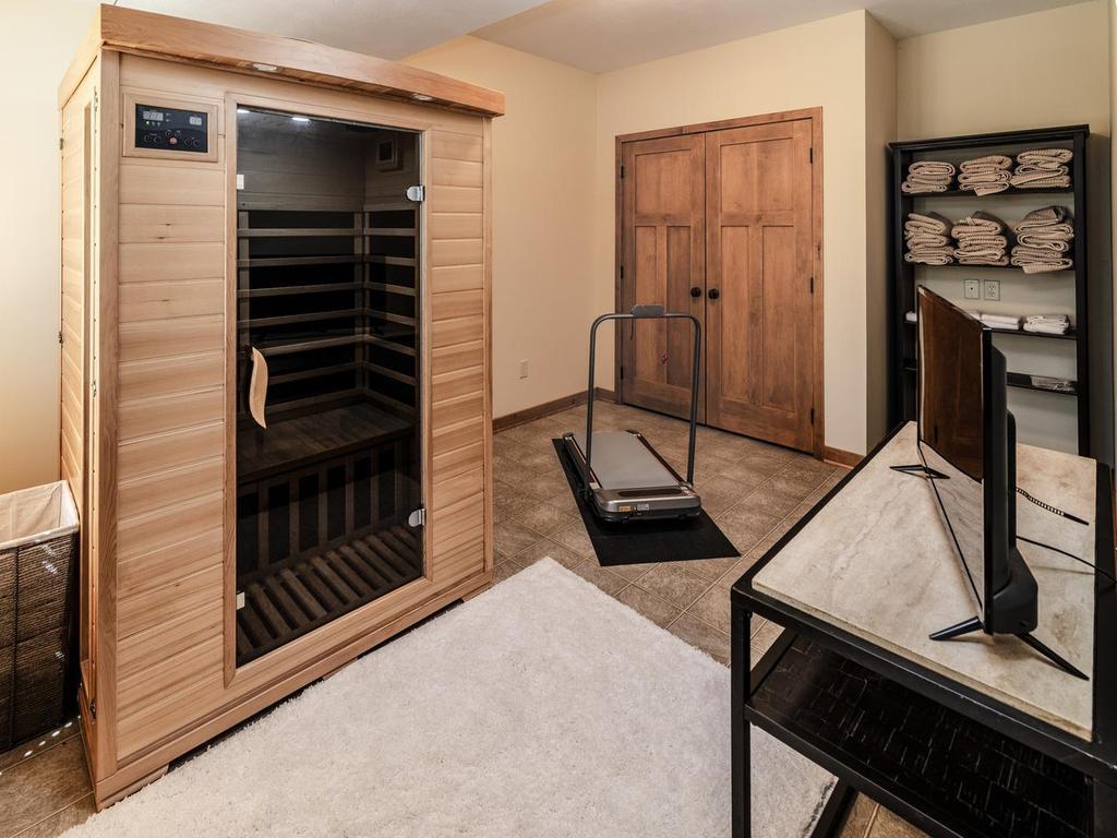 5th bedroom is set up as an exercise/therapy room. *sauna does not stay
