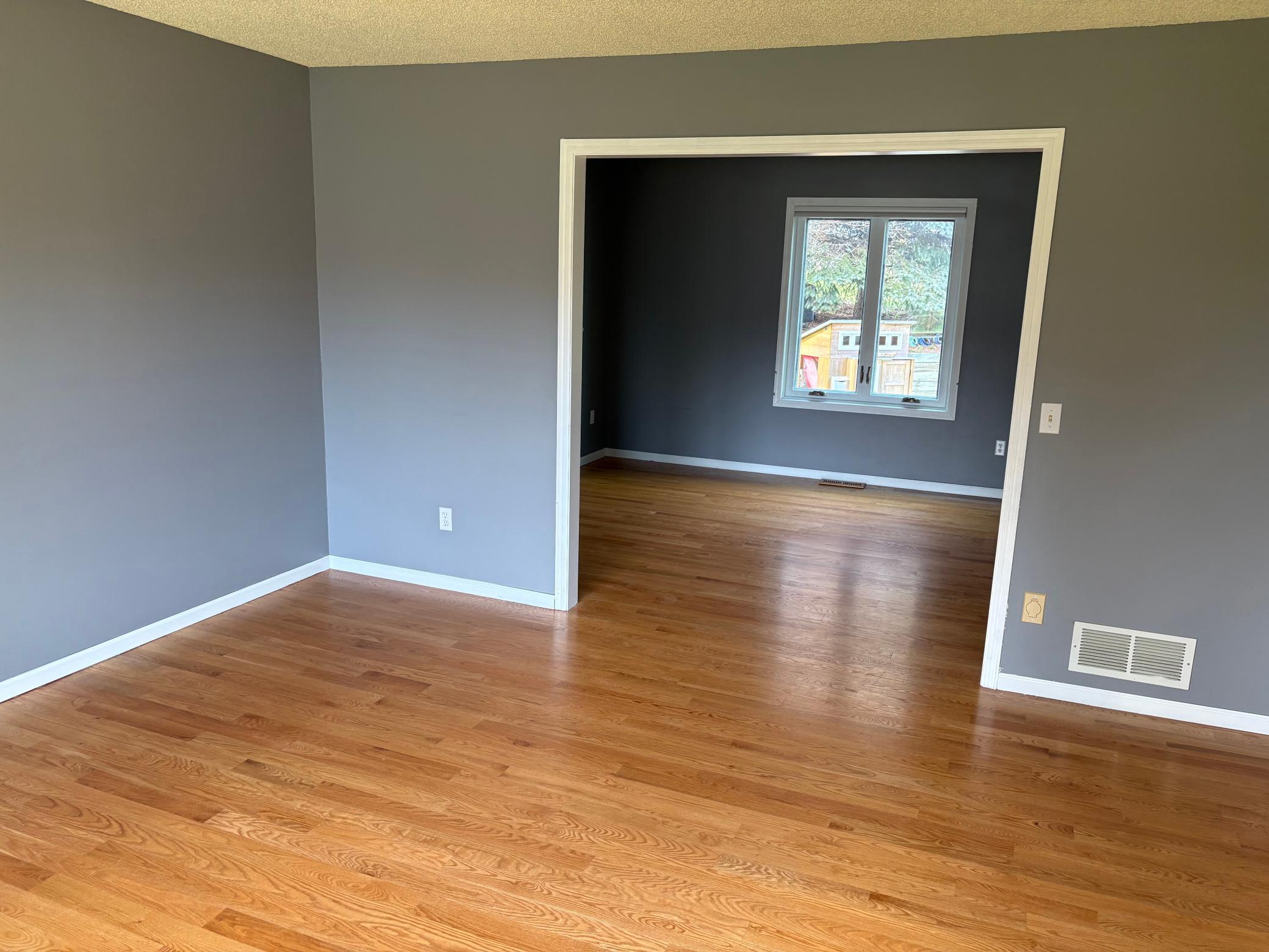 Living room adjacent to the informal dining room or can be used for home office