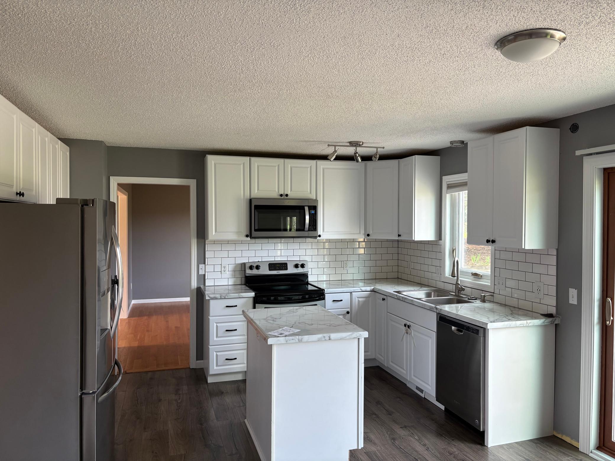 Great workspace with center island and window over the sink
