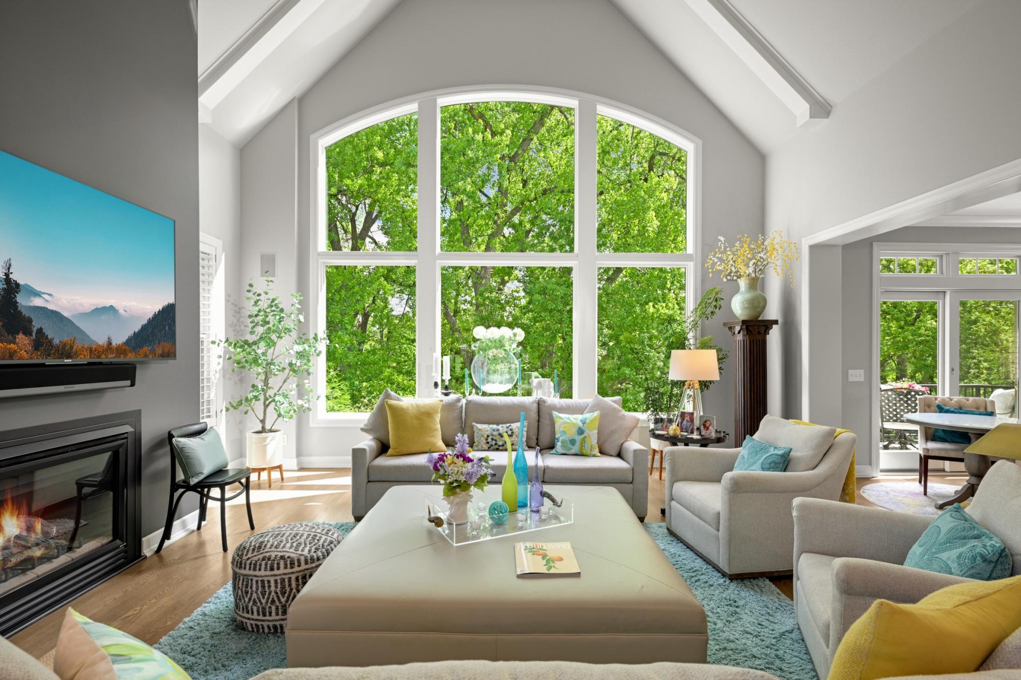 Magnificent Olde Vernon Villa home with main level living overlooking Hawkes Lake in the heart of Edina.