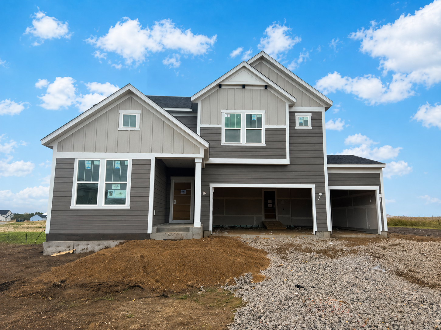 Exterior photo has been virtually enhanced to remove some construction materials.