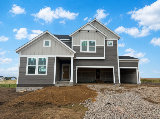 Exterior photo has been virtually enhanced to remove some construction materials.